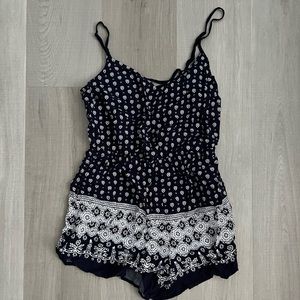 Garage navy romper with back details